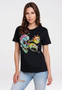 Black cotton t-shirt featuring a colorful skull and character graphic, with detailed accents. Short sleeves and a crew neck design.