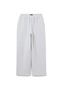 Pantalones de chándal gris claro hechos de una tela suave, con una cinturilla elástica, dos bolsillos laterales y una silueta de pierna ancha.