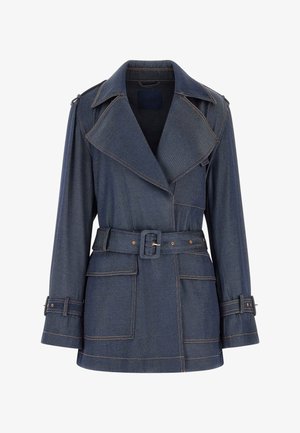 Dark blue denim trench coat with wide lapels, belted waist, buckle straps on cuffs, and large front patch pockets.