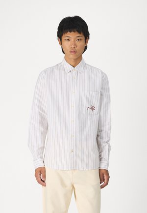 Striped button-up shirt with beige and light blue stripes, featuring a patch pocket with red embroidered logo on the left chest and button cuffs.