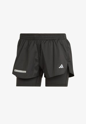 Pantalones cortos deportivos negros con un diseño en capas que incluye una capa exterior de malla, short interior integrado, cintura elástica y logo reflectante.