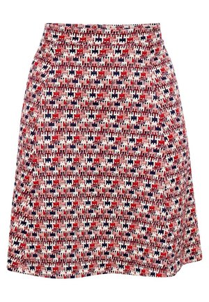 Jupe longueur genou avec un motif géométrique multicolore rouge, blanc et bleu marine et une taille haute.