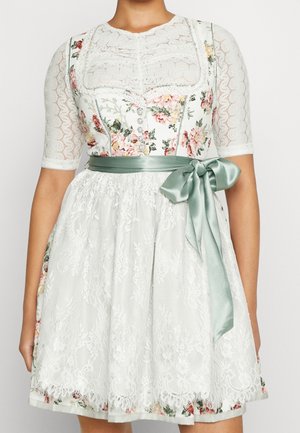 Blomstercorsetkjole med hvid blonder-overlay, halvlange ærmer, knaplukning foran og grøn satin sløjfe bundet i taljen.