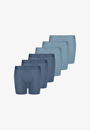Six paires de boxers pour hommes dans des nuances de bleu, disposées en deux groupes alternés de couleurs plus foncées et plus claires.