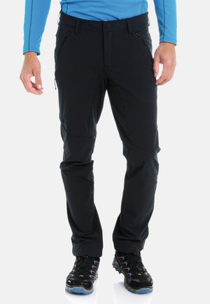 Schwarze Outdoor-Hosen aus Softshell-Material mit Reißverschluss-Taschen, schlanker Passform und vorgeformten Knien für verbesserte Beweglichkeit.