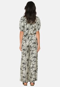 LolaLiza WITH FLORAL PRINT - Hlače - black