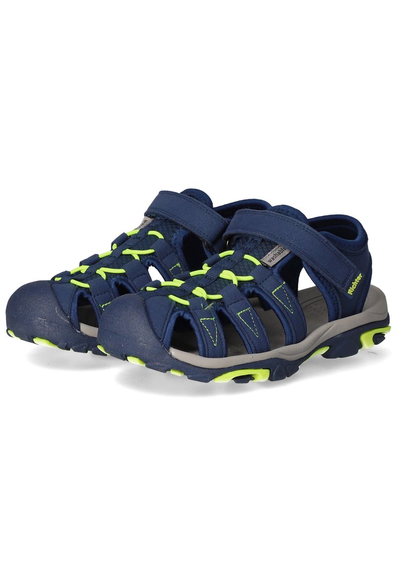 Marineblaue Sandalen mit neongrünen Akzenten, aus synthetischem Material gefertigt. Verfügt über verstellbare Riemen, ein offenes Design und eine strukturierte Sohle.