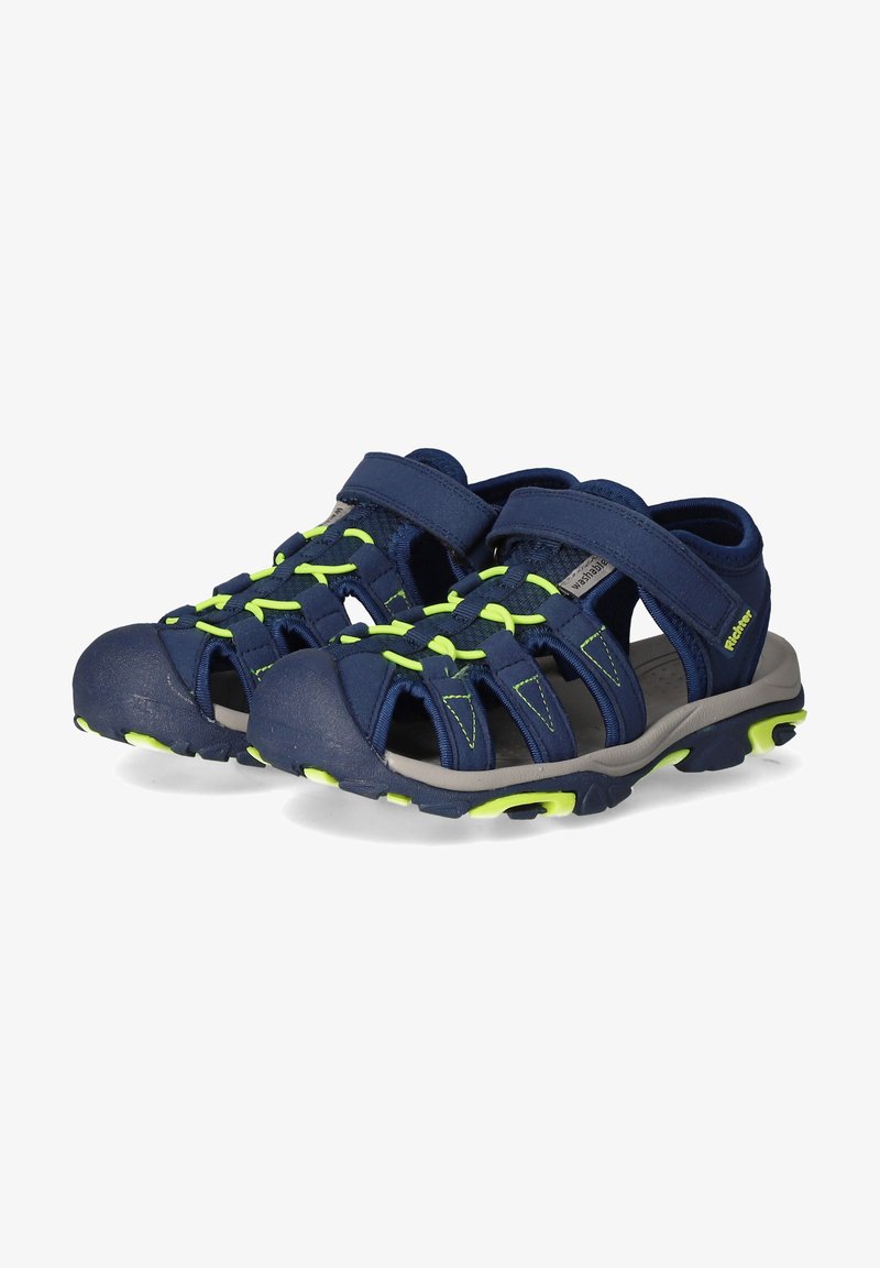 Marineblaue Sandalen mit neongrünen Akzenten, aus synthetischem Material gefertigt. Verfügt über verstellbare Riemen, ein offenes Design und eine strukturierte Sohle.