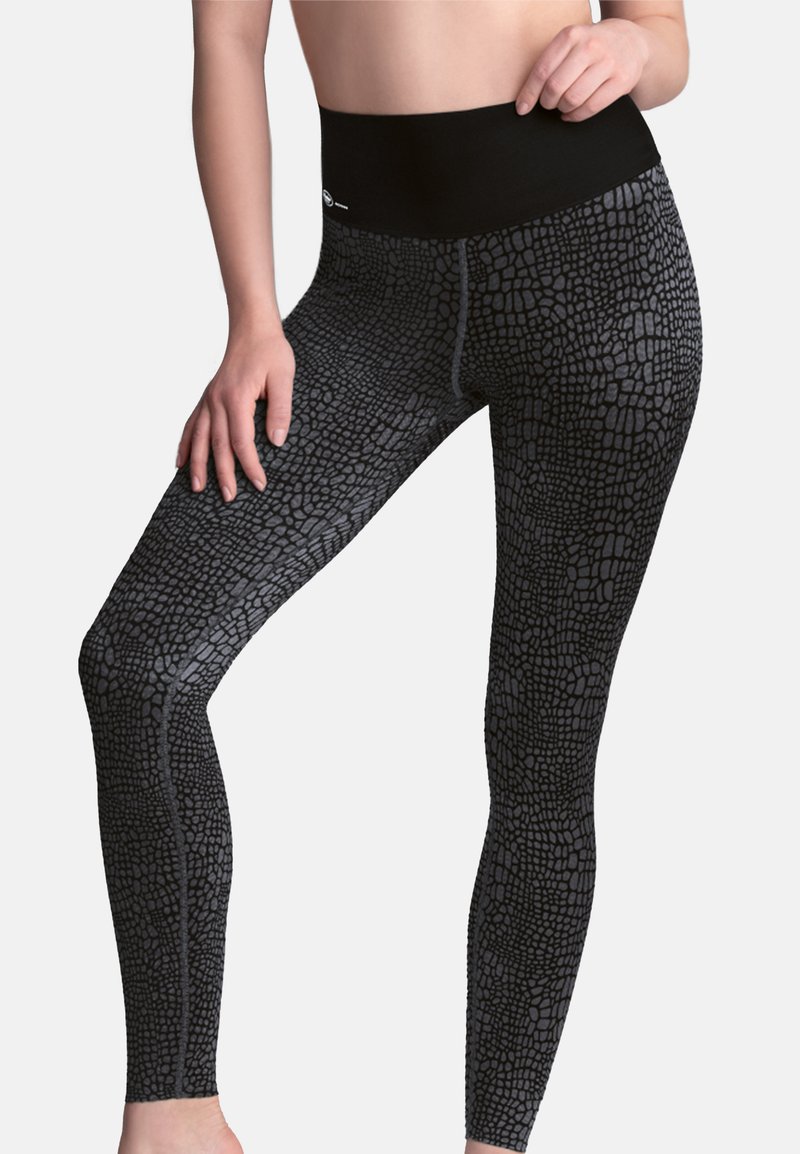 High-waisted black leggings featuring a textured gray reptile pattern, made from stretchy fabric, designed for comfort and movement.