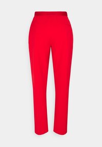 Rode broek met een gladde afwerking en een elastische tailleband, voorzien van twee zijzakken en een slim fit ontwerp. De tailleband heeft het Calvin Klein-logo.