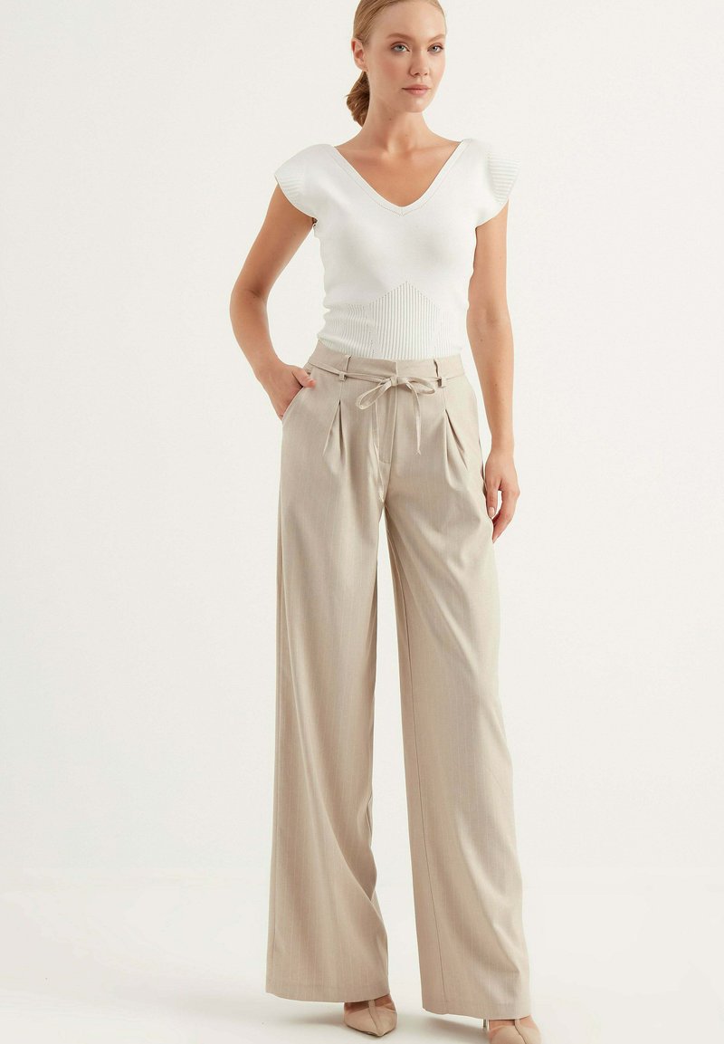 Chiquelle Tygbyxor - beige