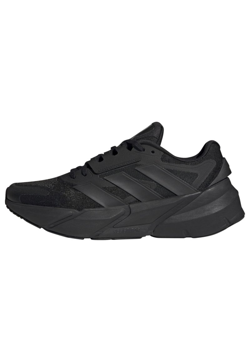 Black athletic shoes with a mesh upper and rubber sole. Features three distinct stripes and a textured design along the side.