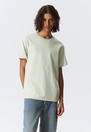 STANDARD - Basic T-shirt - pastel green