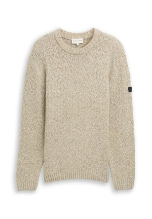 Beżowy sweter dziany z fakturowanej tkaniny, z okrągłym dekoltem oraz ściągaczami przy mankietach i dole. Na rękawie znajduje się czarne logo akcentujące.