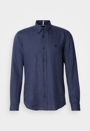 Navy blue long-sleeve button-up shirt made of linen, featuring a button-down collar, dark buttons, and subtle logo detail on the chest.