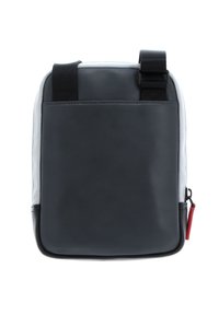 Borsa in pelle nera con dettagli bianchi, dotata di spalline regolabili, una texture liscia e una tasca con zip sul lato.