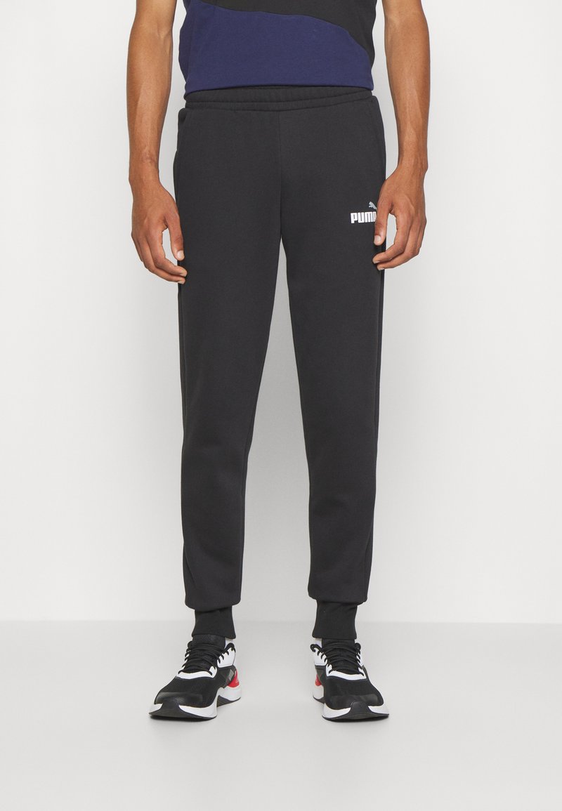 Puma LOGO PANTS Tracksuit bottoms black/white/black Zalando.co.uk