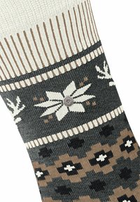Calze lavorate a maglia caratterizzate da un motivo scuro con design floreali bianchi e marroni, una fascia a coste e un piccolo accento di logo metallico.