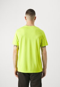 Puma PERFORMANCE TEE - Bluză sport - lime