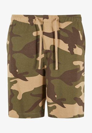 Kamuflasjonsshorts i bomullsblanding med grønne, brune og beige mønstre. Har strikk i livet med snor. Uformell passform og knelengde design.