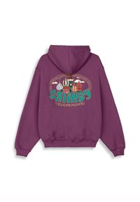 Sudadera morada con un estampado gráfico de coloridos cúpulas de cebolla y texto en verde y dorado. El material parece suave, con un bolsillo tipo canguro.