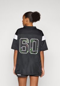 Champion SPORT HERITAGE MINI DRESS - Haljina od žerseja - black/white