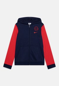 Sudadera con capucha azul marino y mangas rojas, con cremallera frontal, dos bolsillos, logo de Nike y gráfico de baloncesto bordado en rojo en el pecho. Material de mezcla de algodón.