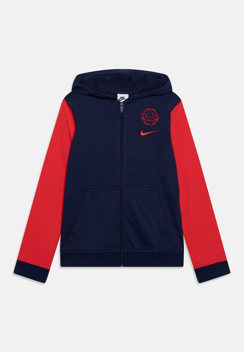 Sudadera con capucha azul marino y mangas rojas, con cremallera frontal, dos bolsillos, logo de Nike y gráfico de baloncesto bordado en rojo en el pecho. Material de mezcla de algodón.