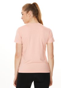 Endurance MAJE - Sports T-shirts - peach whip