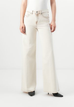 Wide-leg, cream-colored jeans made of denim with a high waist, featuring front pockets, belt loops, and subtle fading details.
