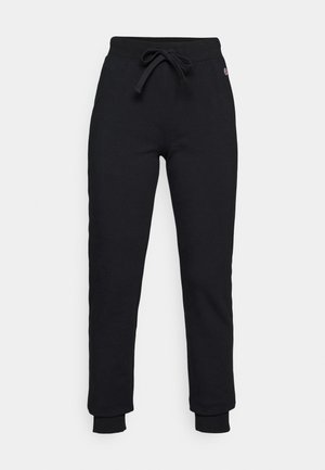 Pantaloni della tuta neri con una cintura regolabile, polsini a coste e una patch logo discreta sull'anca. Realizzati in materiale morbido ed elasticizzato.