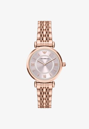 Roségoldene Uhr mit rundem Gehäuse, strukturiertem silbernem Zifferblatt, römischen Ziffern und einem geflochtenen Metallarmband. Verfügt über eine mit Kristallen verzierte Lünette.