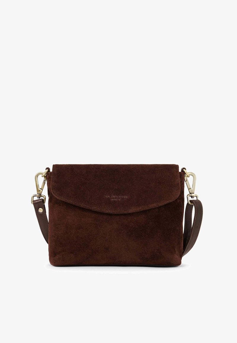 Brown suede crossbody bag with a flap closure, adjustable leather strap, and metal hardware accents. Smooth texture and minimalist design.