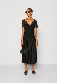 Morgan DENNY - Print T-shirt - noir
