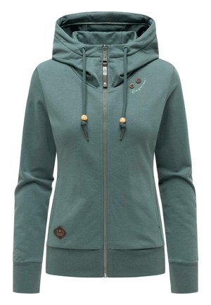 Green zip-up hoodie with drawstrings featuring wooden beads, high collar, two wooden buttons near the chest, and ribbed cuffs and hem.