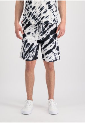 Schwarz-weiße Batik-Shorts mit elastischem Bund und Kordelzug, geradem Schnitt und weichem Stoffgefühl.