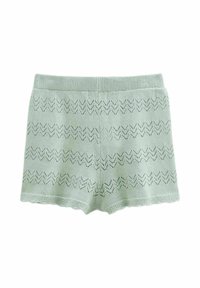 Shorts en tricot vert clair avec un motif en zigzag, une ceinture côtelée et un ourlet festonné. Fabriqués dans un tissu doux et texturé.