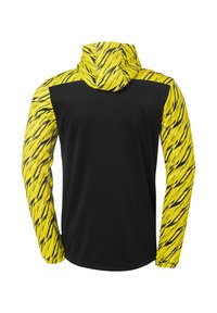 Hættejakke med sort krop og gule, abstrakte stribede ærmer. Lavet af letvægtsstof, har elastiske manchetter for en sikker pasform.