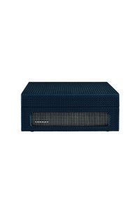 Blue compact speaker with a textured fabric surface, rectangular shape, and a metal grille at the front with brand logo visible.