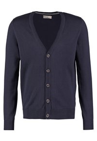 Tummansininen villatakki, jossa on V-pääntie, pitkät hihat ja viisi ruskeaa nappia. Sisältää ribbauskudot hihansuissa ja helmassa, valmistettu pehmeästä ja kevyestä materiaalista.