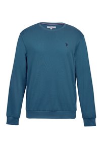 Modrá dlouhá mikina s dlouhým rukávem a kulatým výstřihem, s žebrovanými manžetami a lemem. Obsahuje malé logo na hrudi. Měkký, strukturovaný bavlněný materiál.