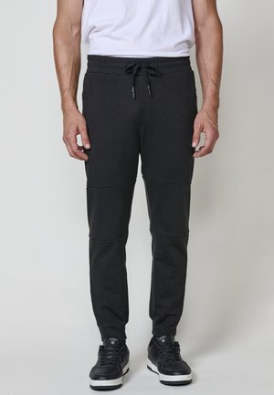 JOGGER - Jogginghose - black