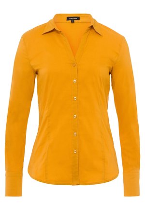 Long-sleeve mustard yellow button-up shirt with collar and fitted waist, featuring seven buttons down the front.