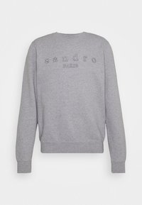 Sudadera gris con cuello redondo, mangas largas y lettering en relieve "sandro PARIS" en la parte posterior. Fabricada en una mezcla de algodón.