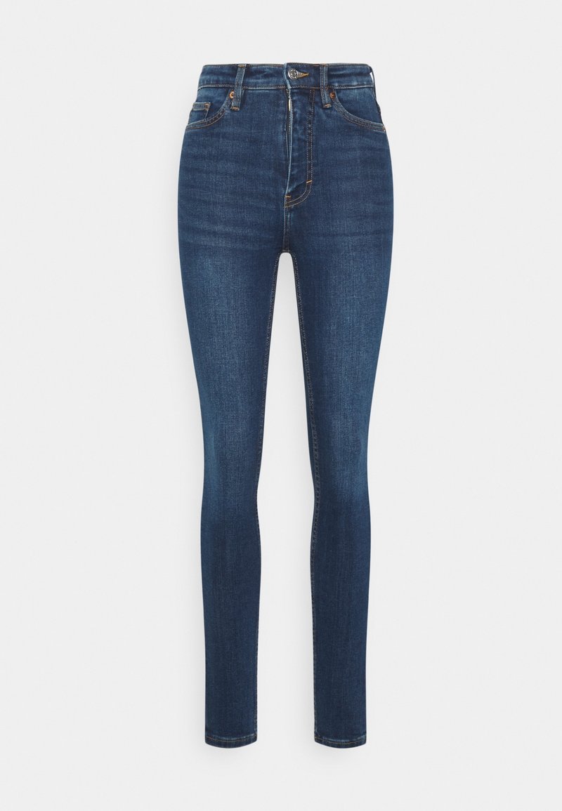 Jeans ajustados de cintura alta color azul oscuro, con botón frontal, cierre de cremallera y diseño de cinco bolsillos, exhibidos sobre un fondo blanco sencillo.