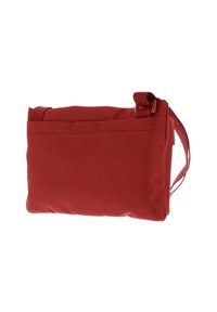 Red fabric shoulder bag with a textured surface, rectangular shape, adjustable strap, and a front pocket.