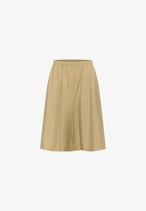 Beige hame, joka on joustavalla vyötärönauhalla, polvipitkä, valmistettu sileästä, hieman kiiltävästä kankaasta, joka laskeutuu hellästi ja jossa on yksinkertainen muotoilu.