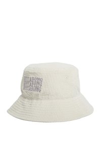 Kapa od teksturiranog kordura materijala, u off-white boji s ljubičastim izvezenim "Billabong" više puta duž oboda.