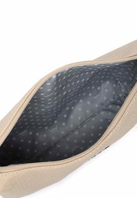 Béžové texturované pouzdro se zipovým uzávěrem. Vnitřek je vybaven šedou podšívkou s bílými puntíky. Plochý design ideální pro organizaci drobných předmětů.