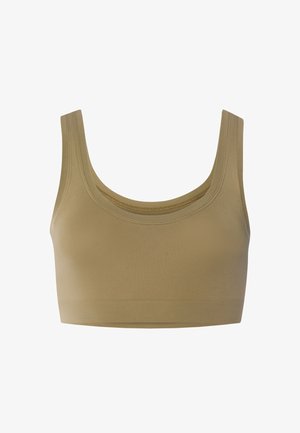 Béžová sportovní podprsenka bez švů se širokými ramínky a výstřihem do písmene U, navržená pro pohodlí a podporu během fyzické aktivity.